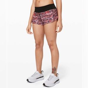 New without tags Lululemon Speed Up Short *2.5"
Flash Pleat Orange Multi / Black